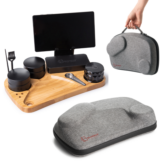 A collection of smoking accessories including a wooden rolling tray, a metal grinder, a phone holder, two metal cones, a compressing stick, and scissors, all laid out on a white background. One accessory is shown in use holding a phone, and another is shown in a rolled state with the brand name visible.